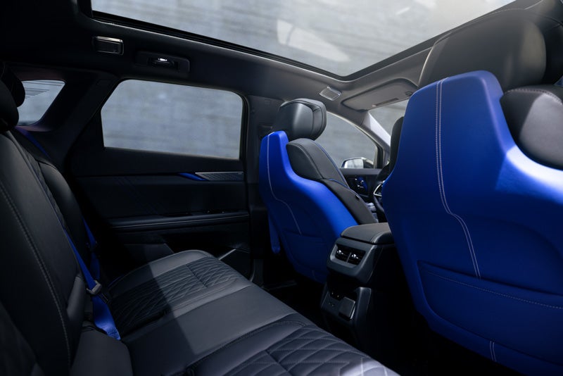 Back Seat View of the 2026 OPTIQ-V Blue Front Seats, Sun Roof, and Interior | Sapaugh Cadillac in Herculaneum MO